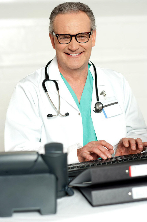 doctor updating medical notes