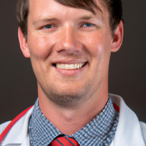 a professional and visually appealing image of a young happy smiling caucasian doctor with white teeth