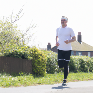 a professional appealing image of a caucasian man or woman jogging on a sunny day