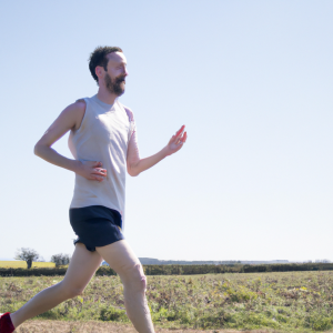 a professional appealing image of a caucasian man or woman jogging on a sunny day