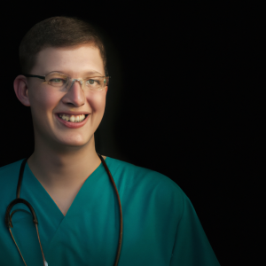 a professional and visually appealing image of a young happy smiling caucasian doctor with white teeth