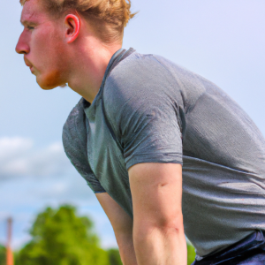 a professional appealing good looking and atheletic image of a caucasian man exercising or playing sports outside on a sunny day